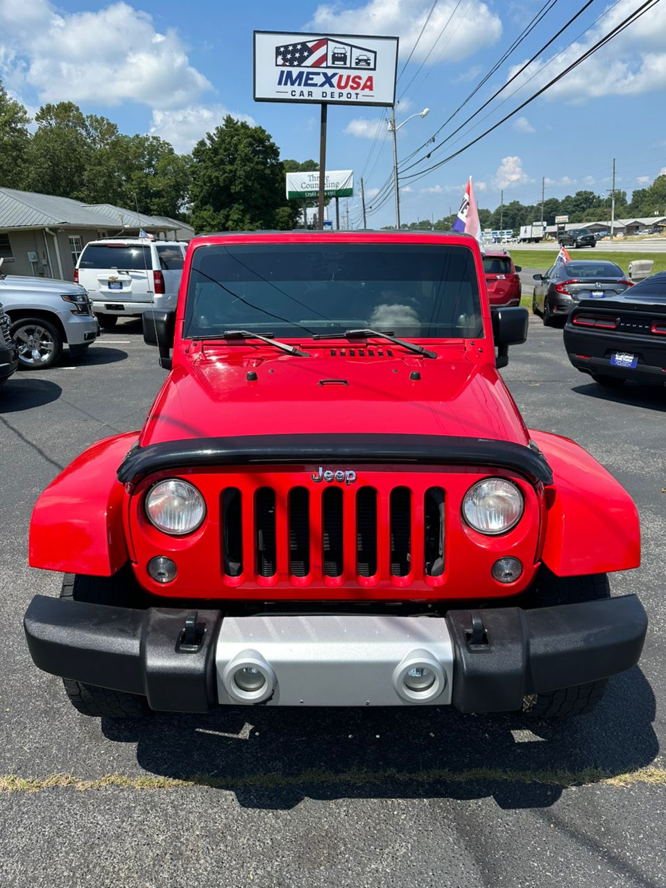 
								Jeep Wrangler Unlimited Sahara Red 2014 full									