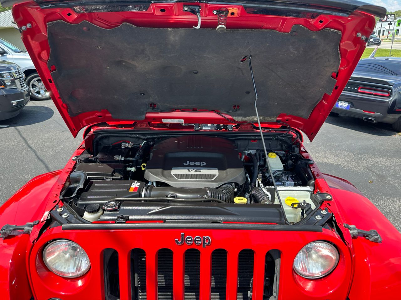
								Jeep Wrangler Unlimited Sahara Red 2014 full									