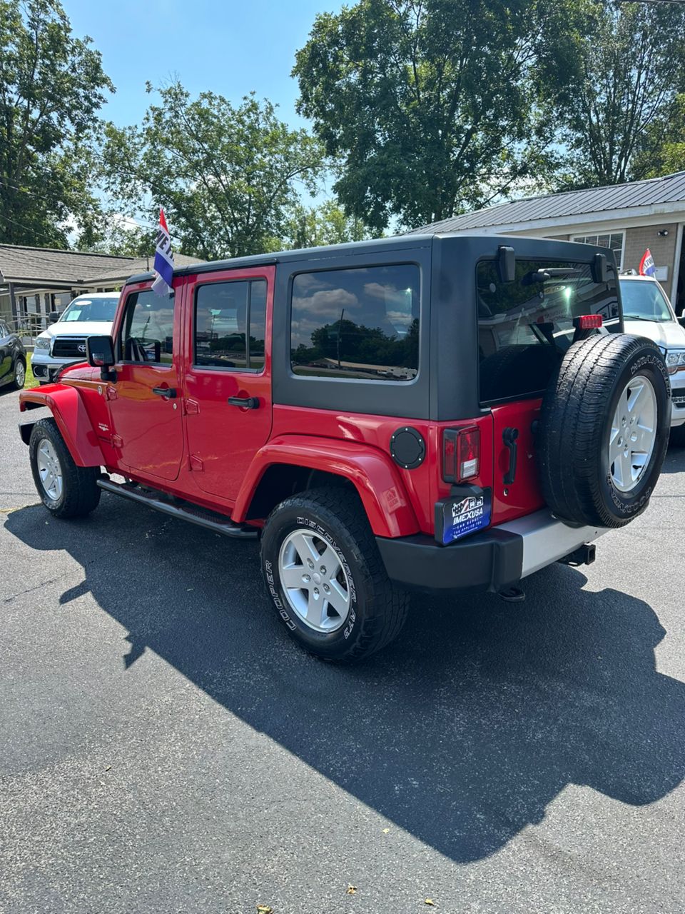 
								Jeep Wrangler Unlimited Sahara Red 2014 full									
